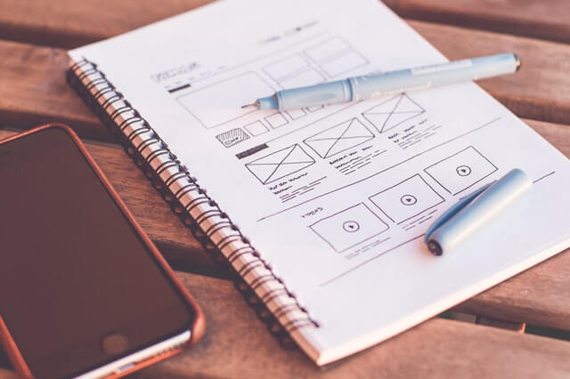  notebook and cell phone